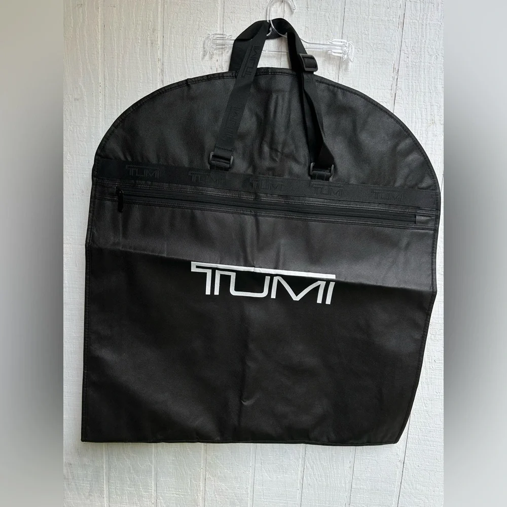 Tumi Travel Garment Bag black suits and dresses, during travel NEW 52” long 23”